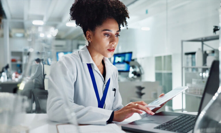 Researcher preparing a Clinical Study Report (CSR) using digital tools to ensure accuracy, transparency, and regulatory compliance