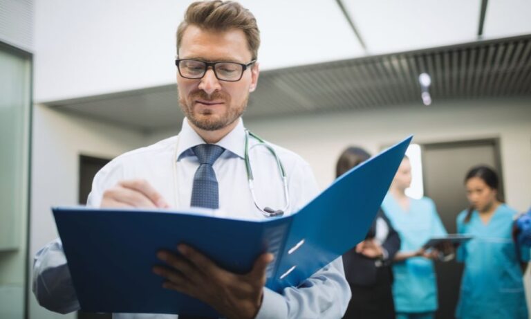 Clinical research professional reviewing documents for 21 CFR Part 11 compliance in clinical trials